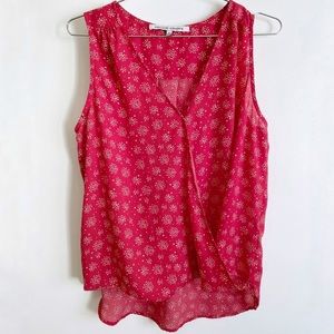 Sleeveless blouse by Collective Concepts. Size S.
